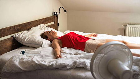 Should I sleep with a fan on? Here are the pros and cons