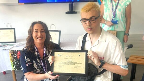 Karen Massey, deputy general manager of Naas General Hospital, with Jake Dobbyn at the 2025/26 Project SEARCH graduation Karen Massey, deputy general manager of Naas General Hospital, with Jake Dobbyn at the 2025/26 Project SEARCH graduation