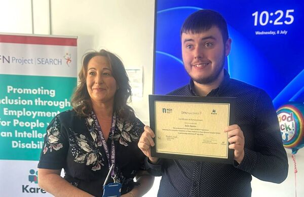 Eoin Quinn being presented his certificate Eoin Quinn being presented his certificate