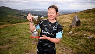 <p> Winner of U16 camogie, Eloise McConn of Kildare, with her cup after the M. Donnelly GAA Poc Fada All-Ireland final at Annaverna Mountain in Cooley Peninsula, Louth. Photo by Ben McShane/Sportsfile </p>