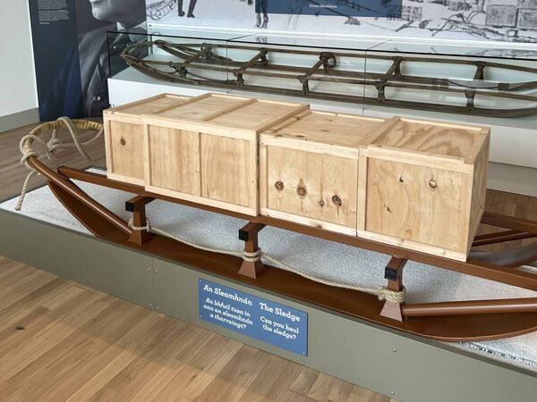 One of the interactive exhibits is a weighted model of a sled that you can pull One of the interactive exhibits is a weighted model of a sled that you can pull