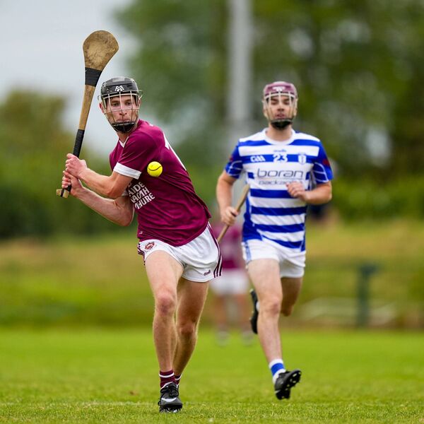Leixlip's Sean O'Connor scoring a point during the second half. Leixlip's Sean O'Connor scoring a point during the second half.