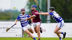 <p>Leixlip's Eoghan Harrington lays off the sliotar. Photos: James Lawlor.</p> <p>Leixlip's Eoghan Harrington lays off the sliotar. Photos: James Lawlor.</p>