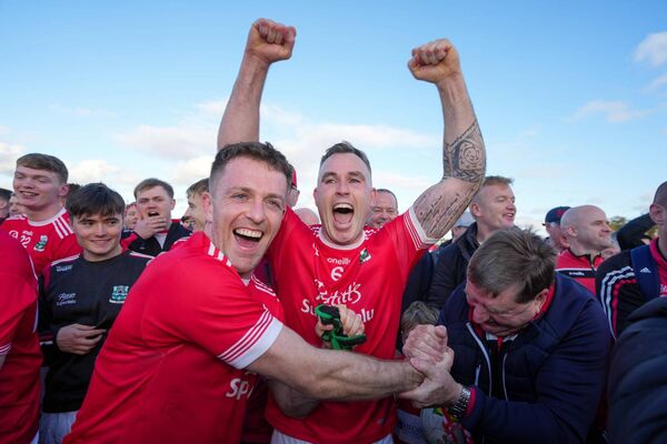 Cathal McCarron celebrate's last year's county final win with Niall Kelly Photo: ©INPHO/James Lawlor