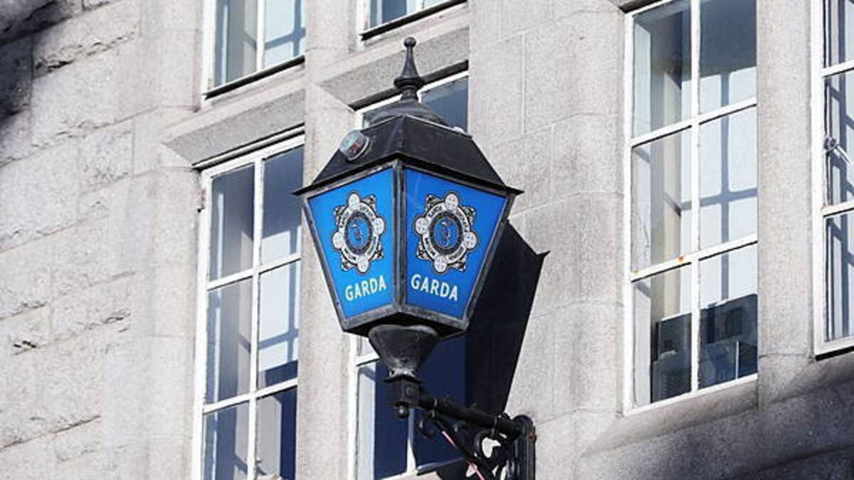 Garda charged with soliciting murder of woman and three children