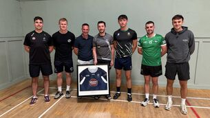 <p>Kildare manager Brian Dowling and some of the Kildare players with Paddy McKenna</p>