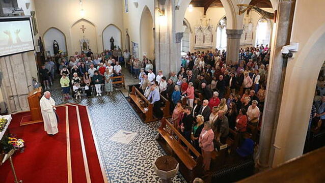 Hundreds gather in vigil for family injured in M9 crash