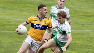 <p>Raheens' Jack Taaffe goes around Sallins' Eoin McConnon. Photo: Sean Brilly.</p> <p>Raheens' Jack Taaffe goes around Sallins' Eoin McConnon. Photo: Sean Brilly.</p>