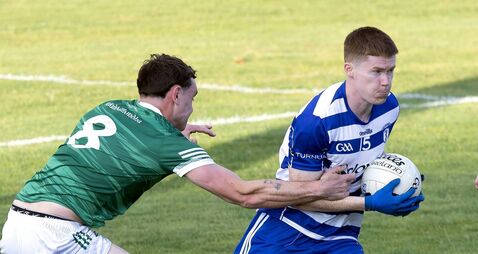 Naas hold off late Moorefield surge to claim opening round win