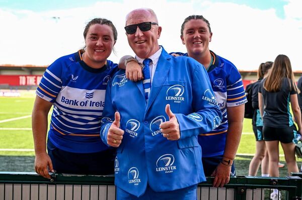 Dave Wilson is decked out in Leinster blue as he and his daughters celebrate a first provincial cap for Emma-Jane. Dave Wilson is decked out in Leinster blue as he and his daughters celebrate a first provincial cap for Emma-Jane.