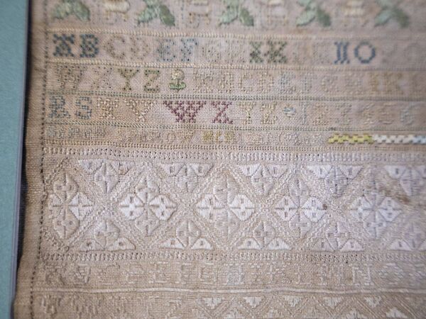 A detail from the 17th-century sampler stitched by an 11-year-old Quaker girl A detail from the 17th-century sampler stitched by an 11-year-old Quaker girl
