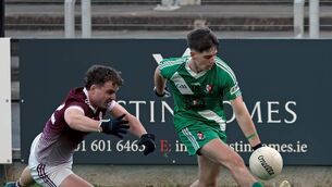 <p>Sarsfields' goalscorer Conor O'Donovan solos the ball away from Caragh's Conor Sullivan. Photos: Sean Brilly.</p> <p>Sarsfields' goalscorer Conor O'Donovan solos the ball away from Caragh's Conor Sullivan. Photos: Sean Brilly.</p>