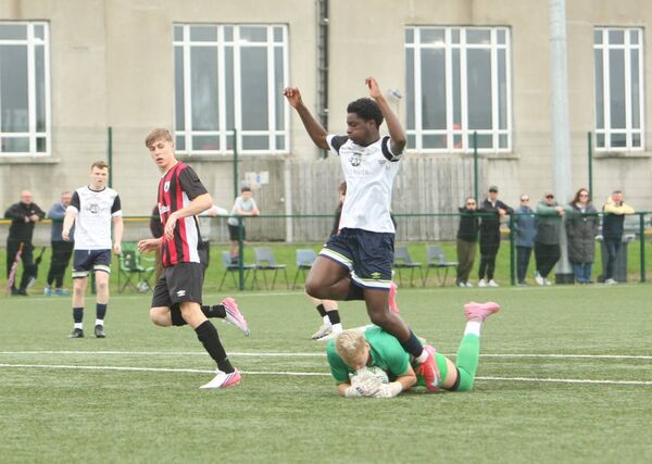 Paul Abankwah is beaten to the ball by the Longford goalkeeper Paul Abankwah is beaten to the ball by the Longford goalkeeper