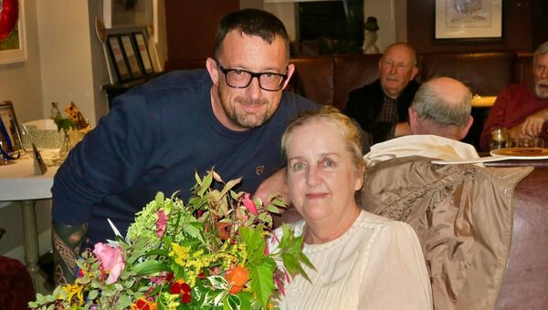 Derek Hoey presenting Ann Cashman with a bouquet of flowers all grown by KCA Derek Hoey presenting Ann Cashman with a bouquet of flowers all grown by KCA