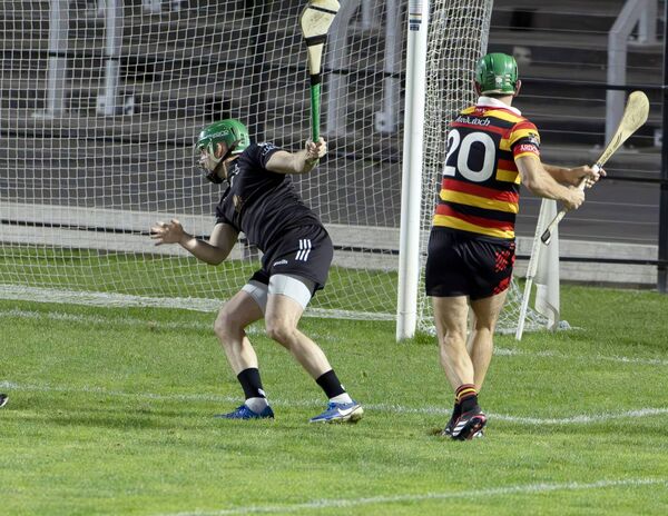 Tony Spain fires home his late match winning goal for Ardclough Photo: Sean Brilly
