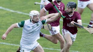 <p>Moorefield's Muiris Curtin is put under pressure by Leixlip's James Canning. Photo: Sean Brilly</p> <p>Moorefield's Muiris Curtin is put under pressure by Leixlip's James Canning. Photo: Sean Brilly</p>