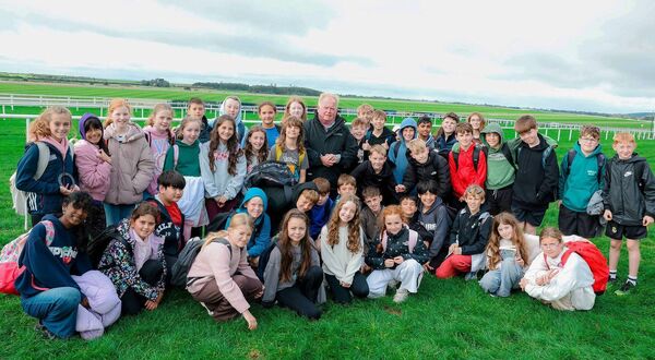 Track Manager Richie Brophy pictured with students from Newbridge Educate Together at the Curragh Racecourse Track Manager Richie Brophy pictured with students from Newbridge Educate Together at the Curragh Racecourse