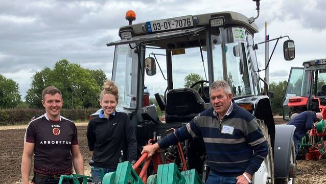 <p>Kildare's Ailish Osbourne who placed second this year in the Farmette category in the National Ploughing Championships with her coach John Murphy </p>