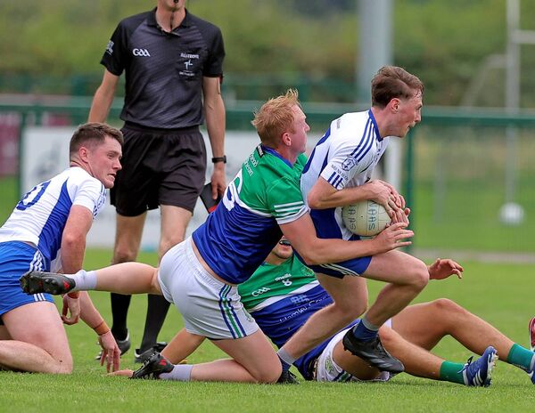 Keith Cribbin tackles Kevin Cummins during the 2024 Championship meeting between Johnstownbridge and Naas, Naas won 0-14 to 0-9. Photo: Sean Brilly Keith Cribbin tackles Kevin Cummins during the 2024 Championship meeting between Johnstownbridge and Naas, Naas won 0-14 to 0-9. Photo: Sean Brilly