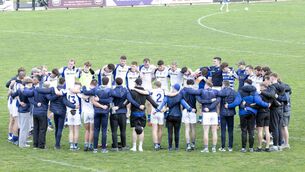 <p>The Naas team in a huddle after beating Johnstownbridge to qualify for the Joe Mallon Motors Senior Football Championship semi-finals. Photo: Sean Brilly</p>