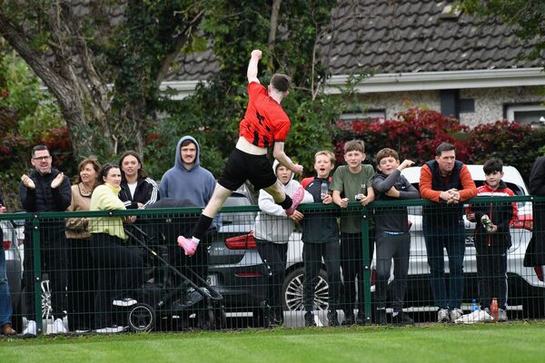 Kildare Town's Ross Farrell celebrates scoring the equaliser in the first half.