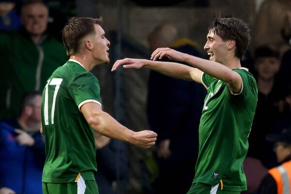 Cathal McCarthy, right, celebrates with Tommy Lonergan after the striker had scored Ireland's first goal of the game against England Photo: ©INPHO/Nick Elliott Cathal McCarthy, right, celebrates with Tommy Lonergan after the striker had scored Ireland's first goal of the game against England Photo: ©INPHO/Nick Elliott