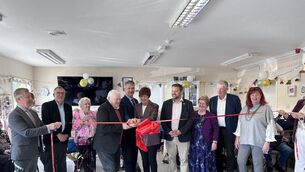 <p>Cutting the ribbon at the official opening of Naas Day Care Centre last week</p>