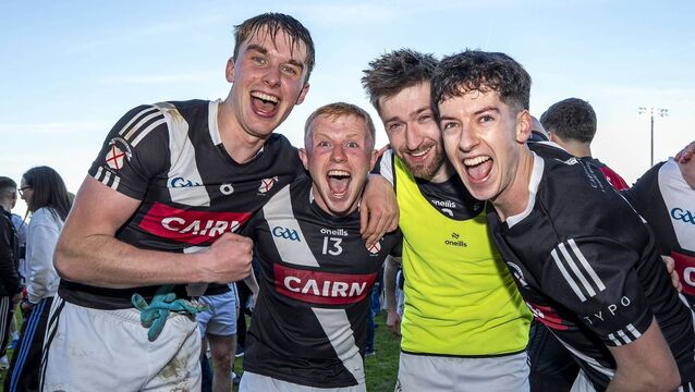 <p>Maynooth players celebrate their famous win over Naas in the Joe Mallon Motors Senior Football Championship Final. Photo: James Lawlor. </p>