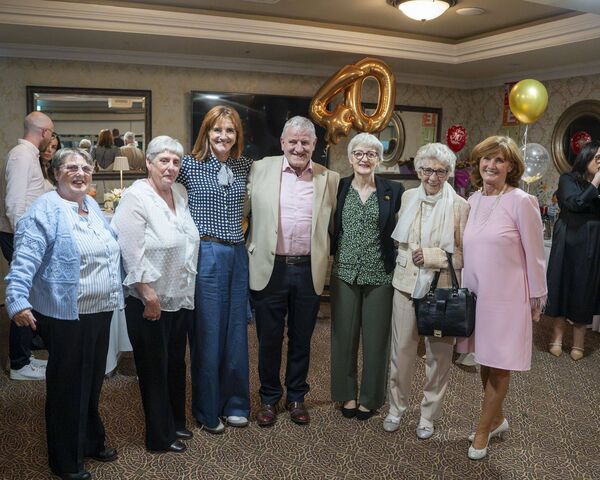 Family, friends and neighbours came out to celebrate with Bridie Family, friends and neighbours came out to celebrate with Bridie