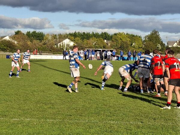 Eoin Farrell spreads the ball wide as Athy go in search of a score late in the second half. Eoin Farrell spreads the ball wide as Athy go in search of a score late in the second half.