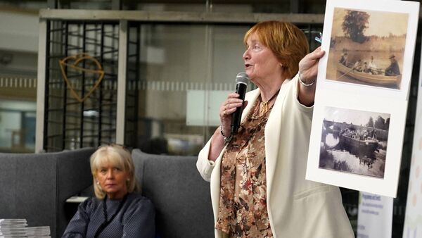Anne Murphy going through the images from yesteryear