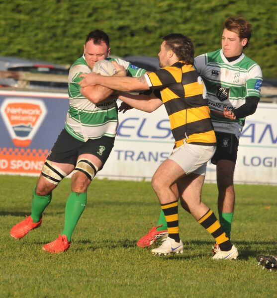 Newbridge's Robbie Waters tries to stop the charge of Naas prop, Jack Walters. Newbridge's Robbie Waters tries to stop the charge of Naas prop, Jack Walters.